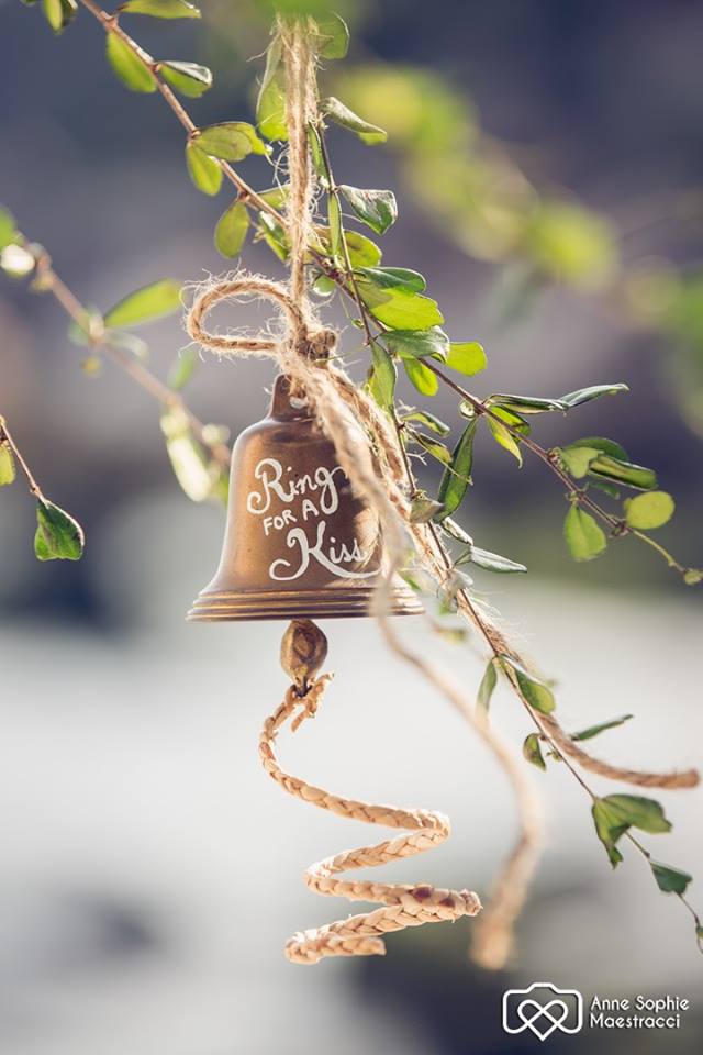 wedding bell with Ring for a Kiss written on it